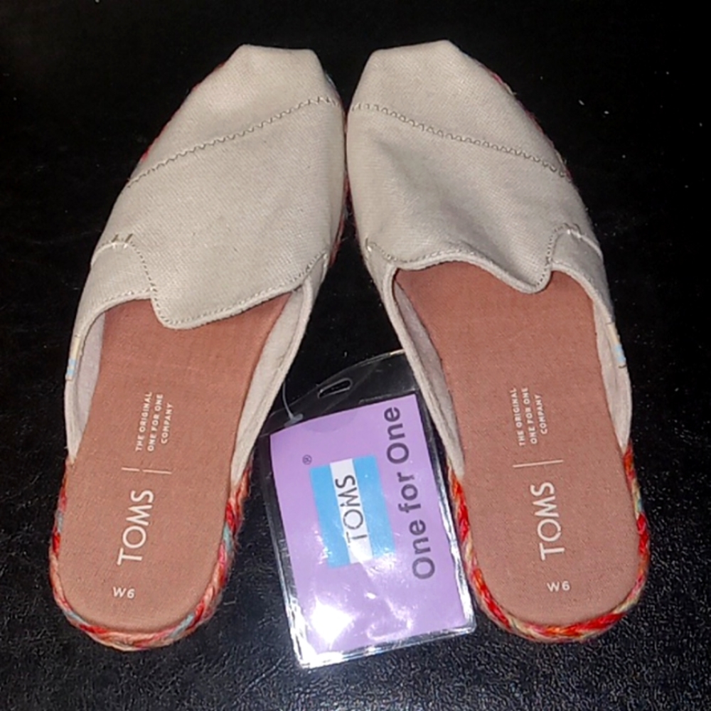 Toms, size W6, slip in mule beige canvas shoes